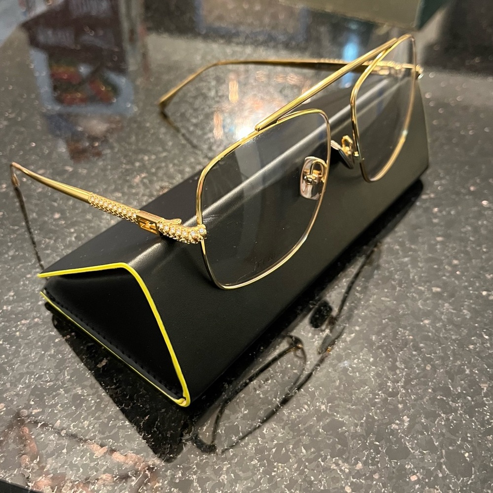 Gold Fendi lenses with rhinestones